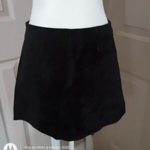 Outer Edge vintage black suede back zip a-line mini skirt. Size 9.